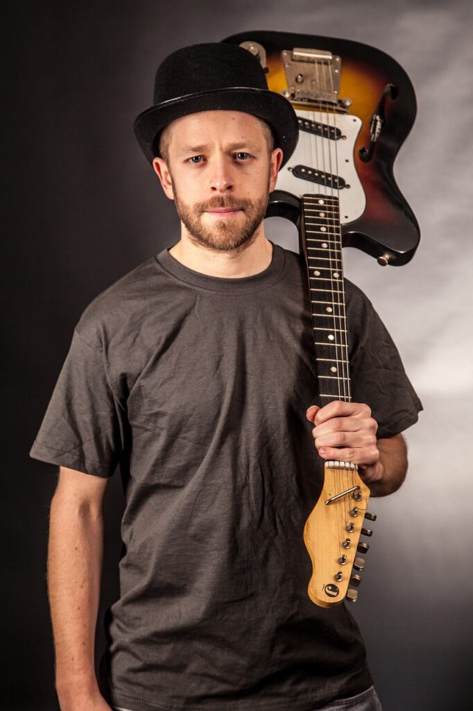 man, guitarist, music-890877.jpg